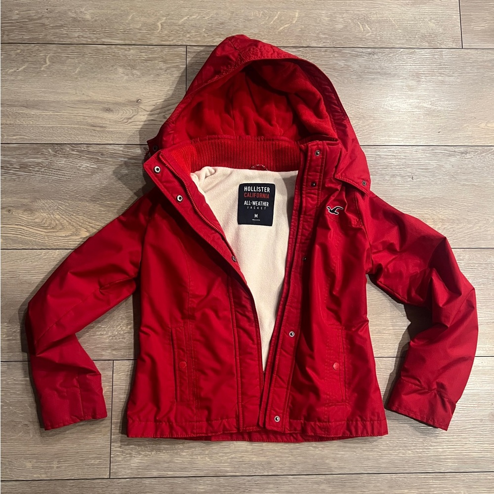 Hollister red all weather jacket. size medium.